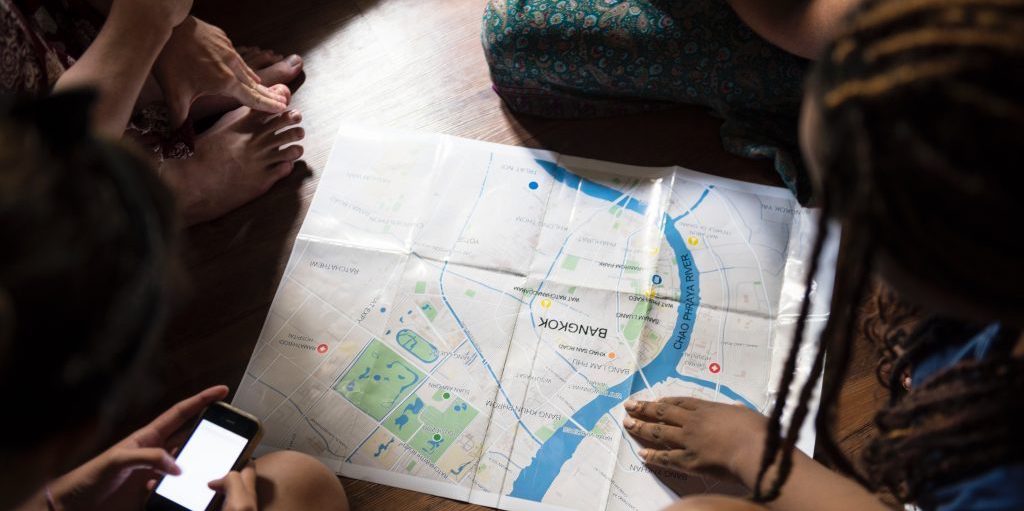 Women looking at map of Bangkok