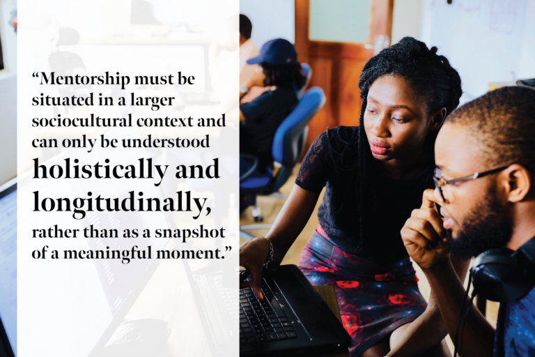 Two Black people work together at a computer, with a quote from the blog post: "Mentorship must be situated in a larger sociocultural context and can only be understood holistically and longitudinally, rather than as a snapshot of a meaningful moment."