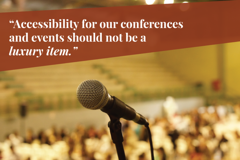 A microphone fills the middle of the image, and a crowd of people is visible out of focus in the background. Text overlay says, "Accessibility for our conferences and events should not be a luxury item."