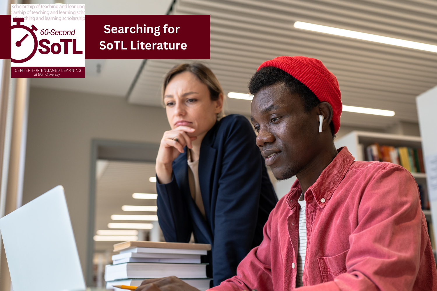 Two people working in a library. One is working on a computer, while also holding a pencil. The other is watching while leaning on a stack of books. An overlay reads, "60-Second SoTL. Searching for SoTL literature."