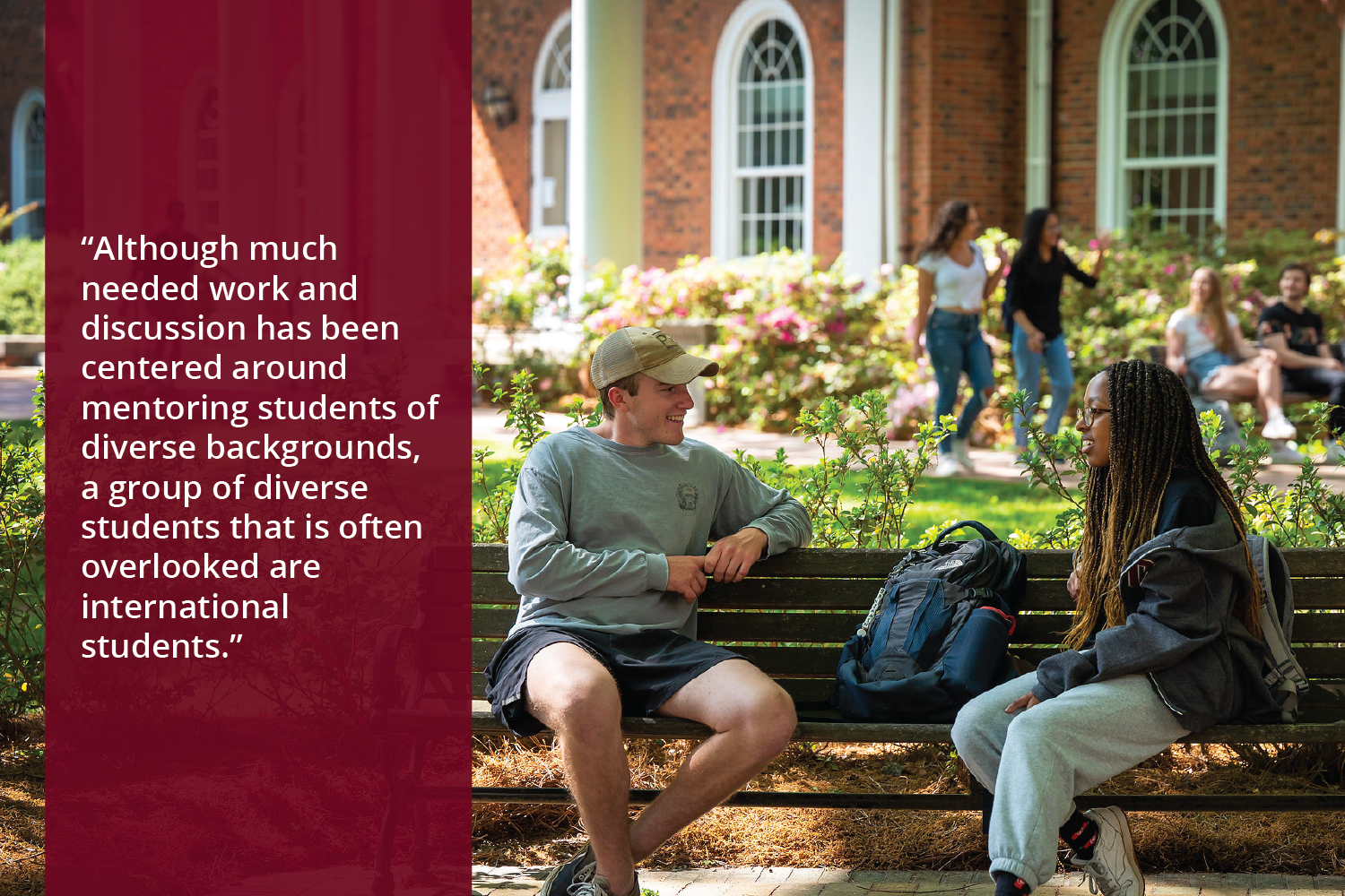 Two students sit on a bench talking. An academic building and more students are visible in the background. Text overlay reads, "Although much needed work and discussion has been centered around mentoring students of diverse backgrounds, a group of diverse students that is often overlooked are international students."