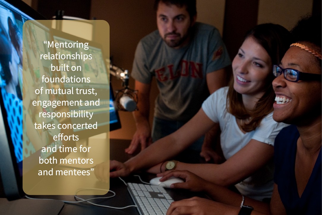 A faculty member and two students gathered by a computer with an extended monitor, looking together at a video editing project. A text overlay reads, "Mentoring relationships built on foundations of mutual trust, engagement, and responsibility take concerted efforts and time for both mentors and mentees."