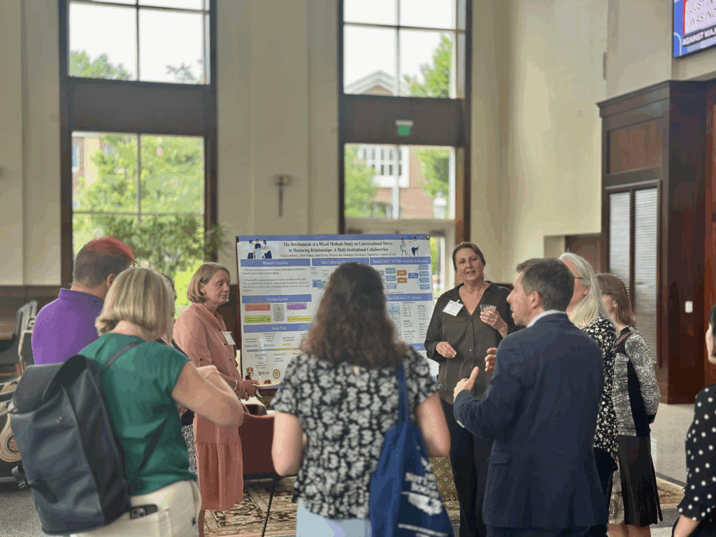 People gather around a poster at the 2025 Conference on Engaged Learning poster session and reception.