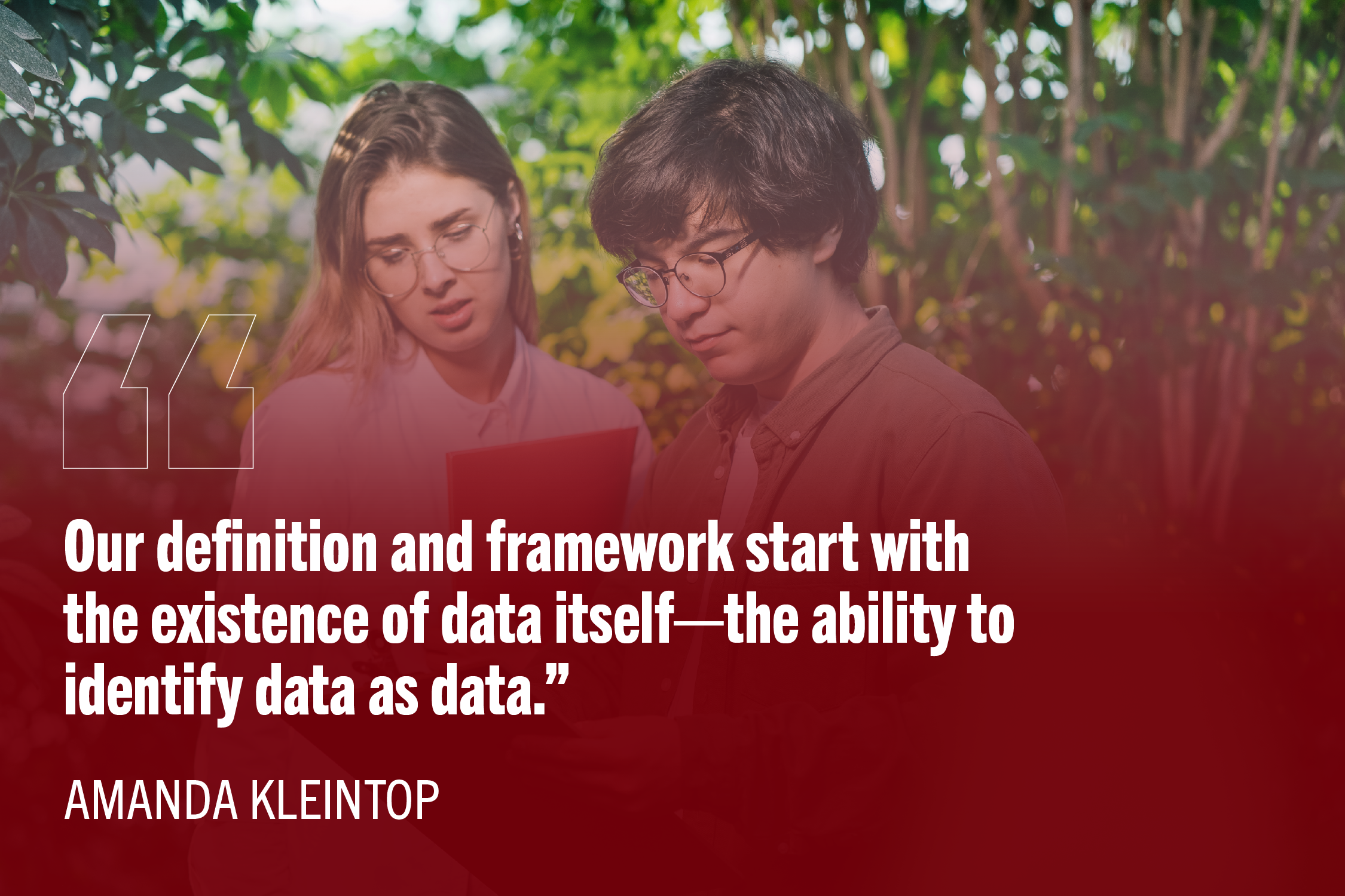 Two field researchers reviewing data with quote: "Our definition and framework start with the existence of data itself—the ability to identify data as data.”